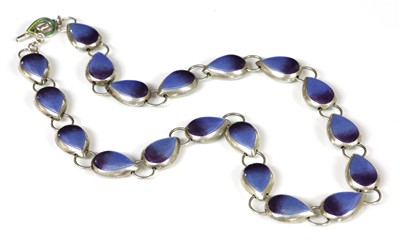 Lot 277 - A sterling silver and enamel double-sided pear drop necklace