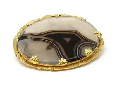 Lot 107 - A Victorian gold mounted banded agate brooch