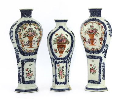 Lot 66 - A pair of Chinese famille rose altar vases