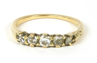 Lot 282 - A gold five stone diamond ring