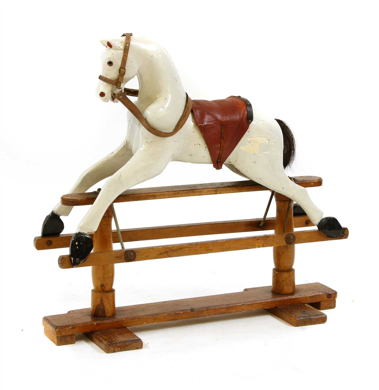 Lot 737 - An early 19th century rocking horse