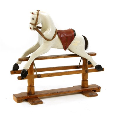 Lot 737 - An early 19th century rocking horse