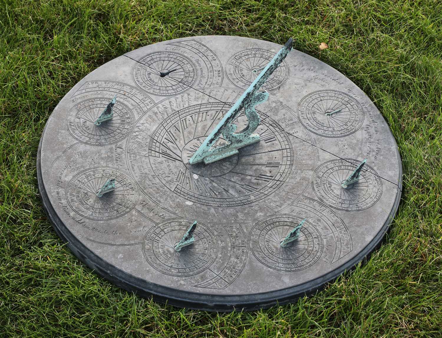 Lot 945 - A rare circular slate sundial by Richard Melvin