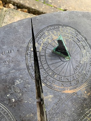 Lot 945 - A rare circular slate sundial by Richard Melvin