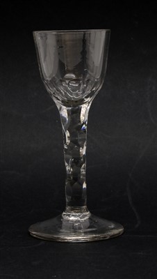 Lot 428 - A late 18th Century facetted stem glass