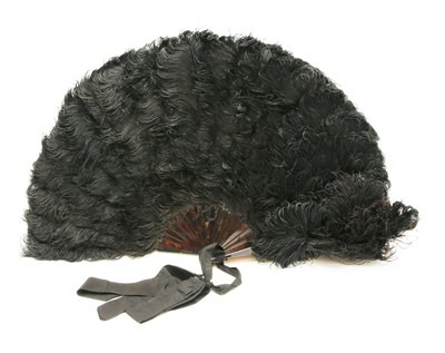 Lot 232 - An Ostrich feather and tortoise shell fan