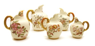 Lot 299 - A group of five Royal Worcester porcelain flat back jugs