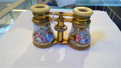 Lot 214 - A pair of continental enamelled porcelain