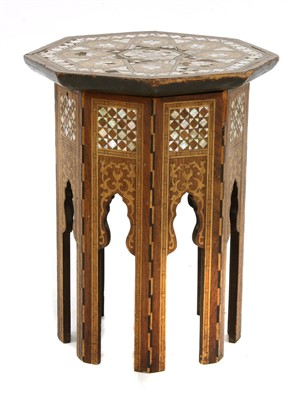 Lot 678 - A middle-eastern mother of pearl inlaid octagonal table