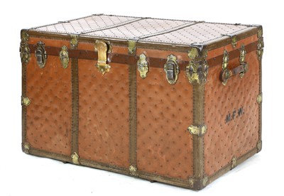Lot 903 - A large leather and studded travelling trunk