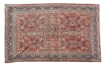 Lot 897 - A large Heriz carpet