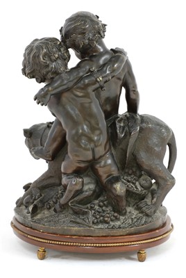 Lot 110 - A bronze group of putti playing with a leopard