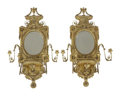 Lot 687 - A pair of Adam-style four-light girandole wall mirrors