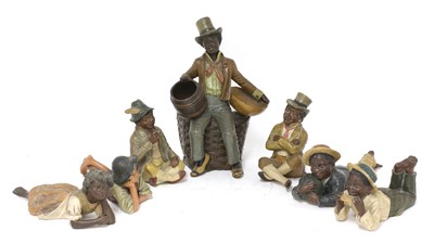 Lot 229A - Seven various 19th century and later terracotta blackamoor and other figures