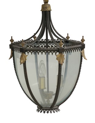 Lot 894 - A gilt brass and ebonised hall lantern of parabolic form