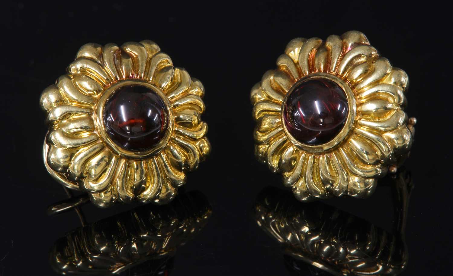 Lot 351 - A pair of Continental gold and garnet set earrings, c.1990