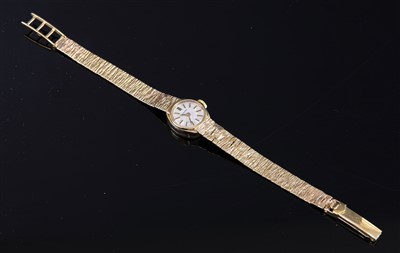 Lot 604 - A ladies' 9ct gold Longines mechanical bracelet watch