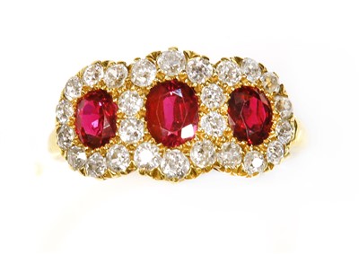 Lot 62 - An Edwardian ruby and diamond triple cluster ring, c.1900