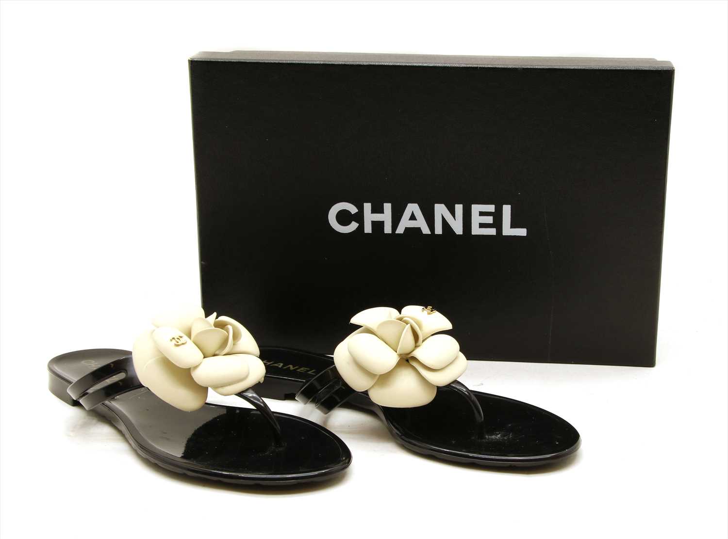 Lot 1038 - A pair of Chanel camellia flower jelly