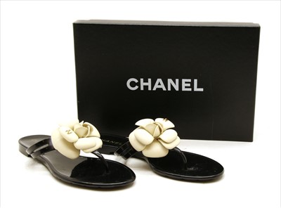 Lot 1038 - A pair of Chanel camellia flower jelly thong sandals