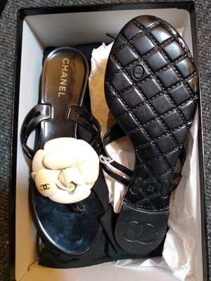 Lot 1038 - A pair of Chanel camellia flower jelly thong sandals