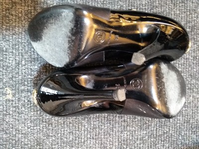 Lot 1035 - A pair of Chanel back patent leather T-bar shoes