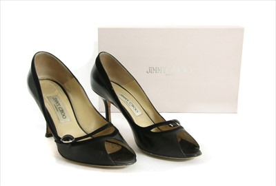 Lot 1046 - A pair of Jimmy Choo black leather court shoes