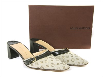 Lot 1040 - A pair of Louis Vuitton monogrammed fabric mules