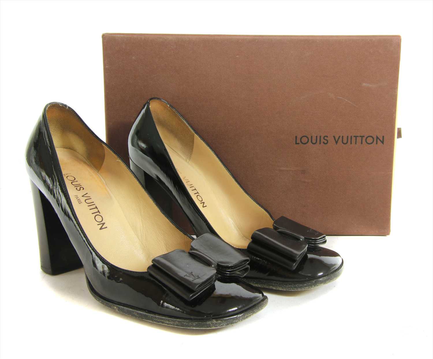 Lot 1039 - A pair of Louis Vuitton brown patent leather court shoes