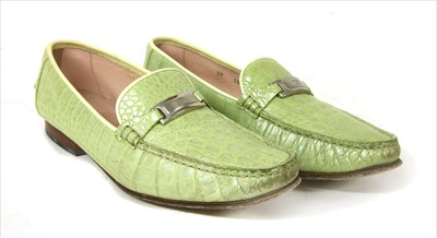 Lot 1050 - A pair of Escada green leather embossed loafers