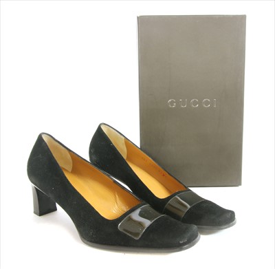 Lot 1042 - A pair of Gucci suede court shoes