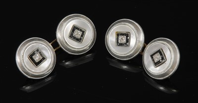 Lot 136 - A pair of Continental Art Deco gold, platinum, diamond, mother of pearl and enamel cufflinks