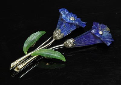 Lot 185 - A Continental white gold lapis lazuli, nephrite and diamond flower brooch
