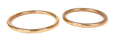 Lot 285 - Two gold bangles