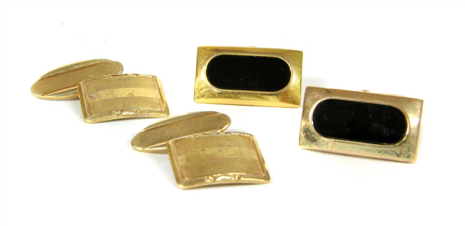 Lot 4 - A pair of 9ct gold onyx cufflinks