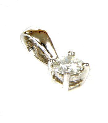 Lot 300 - A white gold single stone diamond pendant