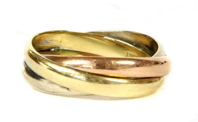 Lot 301 - A three band Russian wedding style diamond ring