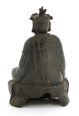 Lot 112 - A Chinese bronze Daoist figure