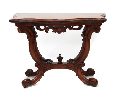 Lot 662 - A William IV rosewood serpentine foldover tea table