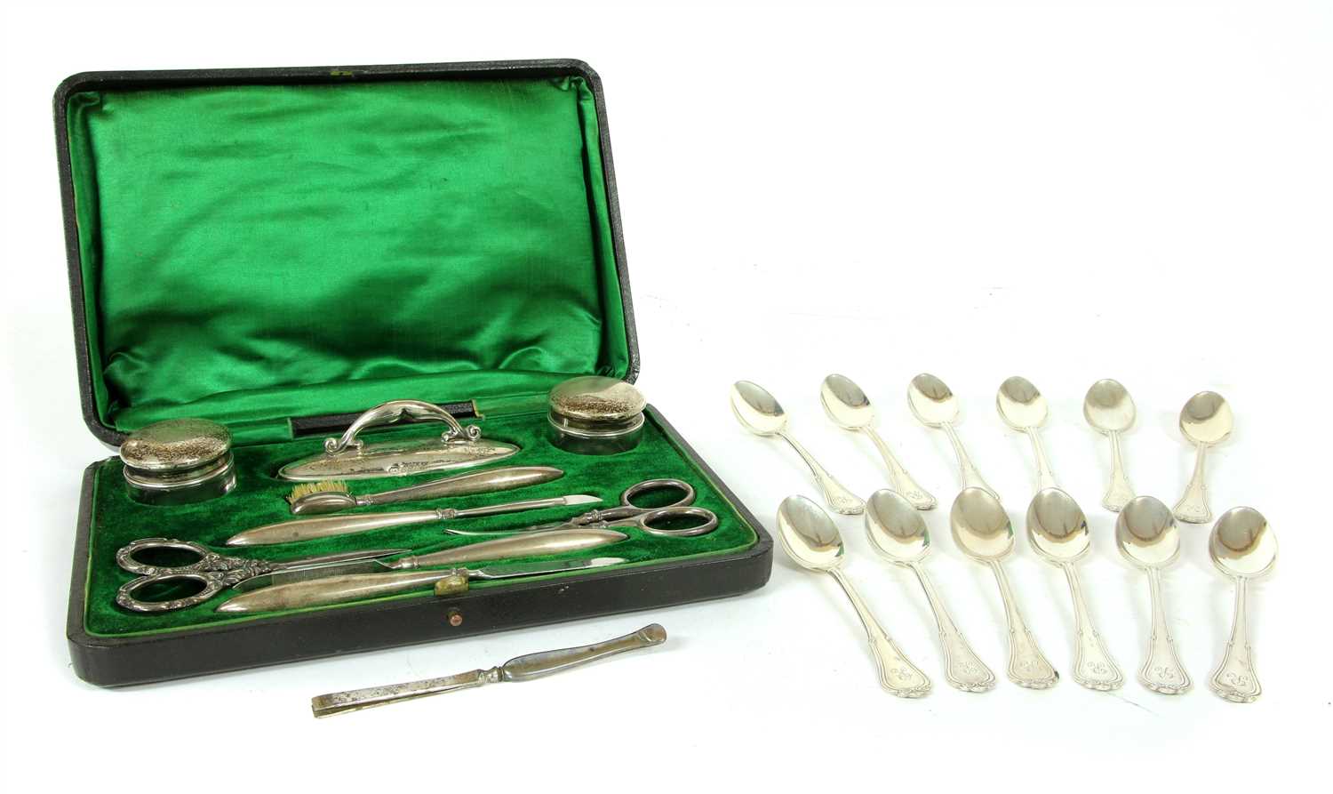 Lot 341 - A set of twelve silver coffee spoons by G M Co Birmingham 1914