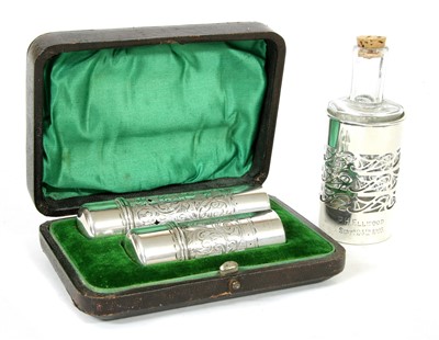 Lot 424 - A pair of silver mounted scent bottles
