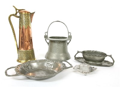 Lot 526 - A copper and brass coffee pot claret jug