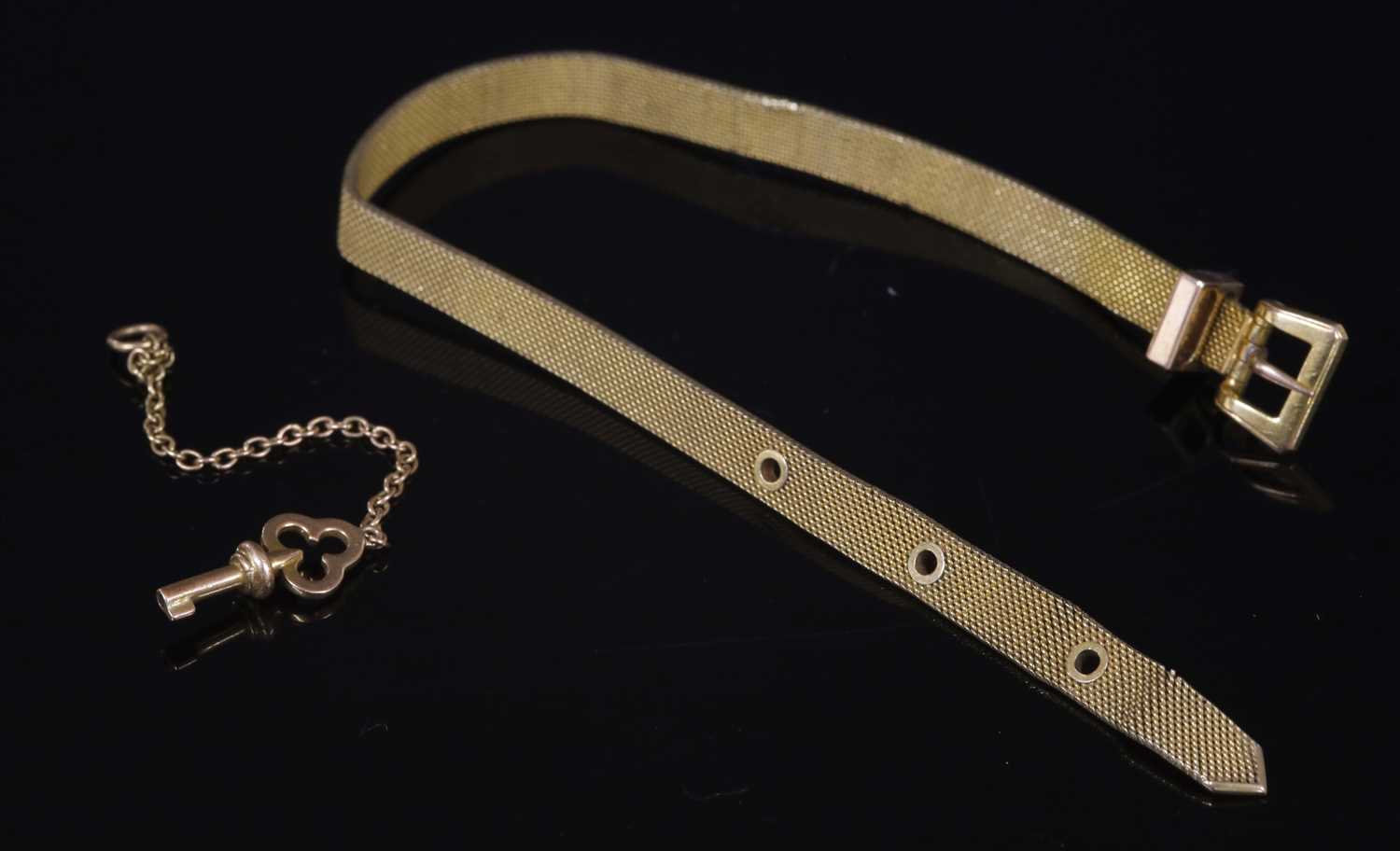 Lot 103 - A gold mesh link jarretière bracelet