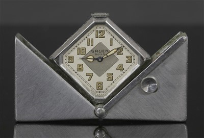 Lot 76 - An Art Deco aluminium Gruen Carre mechanical purse watch c1930