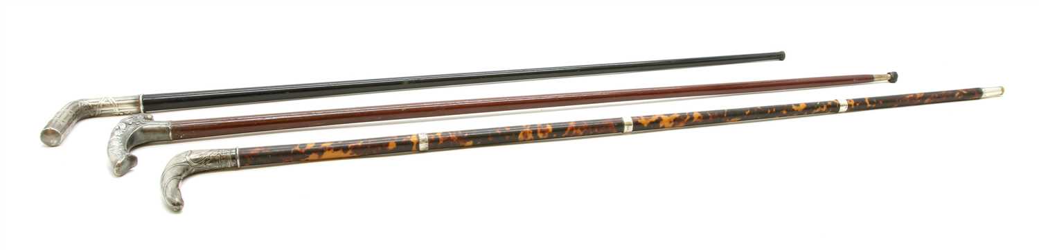 Lot 462 - An early 20th century Continental tortoiseshell and silver walking stick