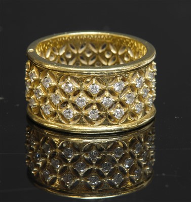 Lot 372 - A gold diamond set flat section band ring