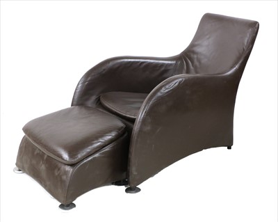 Lot 562A - A brown leather 'Loge' easy chair and ottoman