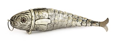Lot 59 - A white metal besamim holder in the form of an articulated fish