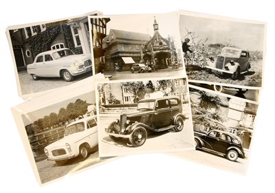 Lot 436 - Sixteen official black and white photos of Ford motor cars, including 1938 Prefect