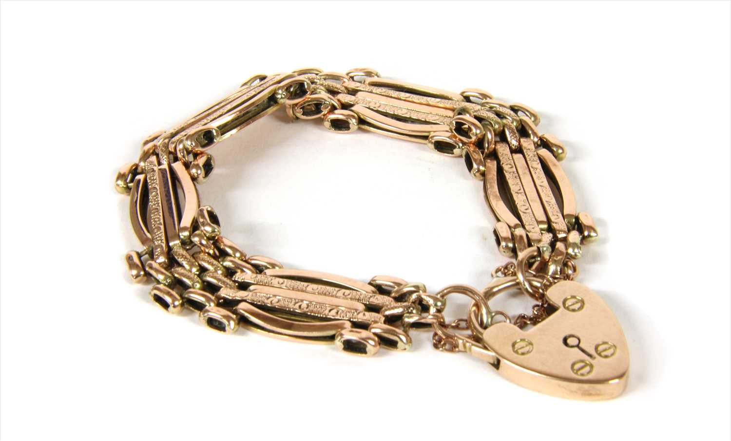 Lot 11 - A 9ct gold five row gate bracelet